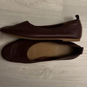 Burgundy Everlane flat shoes.